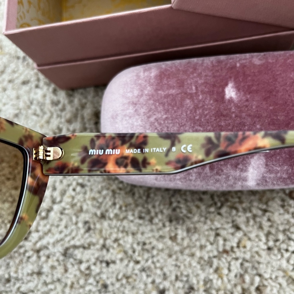 Miu Miu cat eye tortoise sunglasses